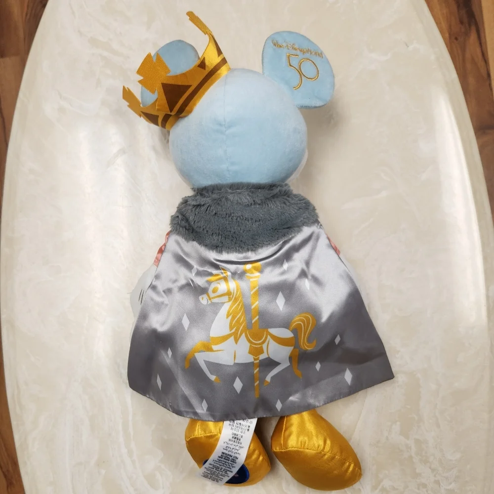 Disney parks 50th Mickey Mouse the main attraction Prince Charming regal